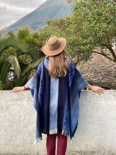 This poncho is made of baby alpaca yarn, one of the finest yarns in the world. It is lightweight, but warm and very soft and won't itch. Colours and patterns might differ slightly from the photo shown as of handmade nature of each item. One size fits most: 45" W x 35" H +2" fringe (116 cm W x 90 cm H + 5 cm fringe) Approx. Weight: 1.5 lbs Materials: Baby Alpaca Wool blend An alpaca (Vicugna pacos) is a domesticated species of South American camelid. It resembles a small llama in appearance.Alpac Bohemian Alpaca Wrap One Size, Bohemian Alpaca Wraps One Size, Handwoven Alpaca Poncho For Fall, Fall Handwoven Alpaca Poncho, Artisan Alpaca Poncho For Fall, Bohemian Alpaca Wrap For Fall, Artisan Poncho For Fall, Artisan Poncho For Fall One Size, Traditional Blue One-size Poncho