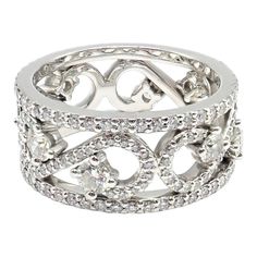 About This Piece: The Tiffany & Co Platinum Diamond Eternal Enchant Wide Band Ring is a testament to exquisite craftsmanship. Designed in size 6, its platinum band is adorned with an intricate array of shimmering diamonds, woven seamlessly into a captivating pattern. This piece epitomizes luxury, elegance, and timeless sophistication. Metal: Platinum  Ring Size: 6  Weight: 10.6 grams Width: 9mm  Stones: 218 Round Brilliant Cut Diamond VS1 clarity, G color, Total weight Approx 1.70ctw  Hallmarks: Luxury Silver Bands With Single Cut Diamonds, Luxury Diamond Ring With Decorative Band, Platinum Eternity Band With Pave Setting, Luxury Diamond Accents Promise Ring Bands, Luxury Bands With Brilliant Cut Cubic Zirconia, Brilliant Cut Diamond White Bands In Fine Jewelry, Diamond White Bands With Brilliant Cut Fine Jewelry, Luxury Cubic Zirconia Bands With Brilliant Cut, Diamond White Bands With Brilliant Cut