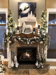 a fireplace decorated with christmas decorations and lights