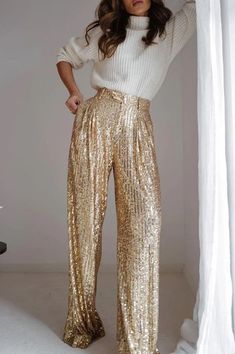 These Structured Wide Leg Sequin Pants will make sure you sparkle at any event. They feature a full lining, providing comfort and support while you look your best. Elevate your evening outfit with these fashionable trousers and ensure your night is one to remember. Sequins Pants Outfit, Gold Sequin Pants, Outfit Elegantes, Cute Christmas Outfits, Gold Pants, Sequin Pants, New Years Outfit, Eve Outfit, Fashion Trends Winter