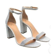 Inc International Concepts Women's Silver Sandals Step Into A World Of Elegance And Sophistication With The Inc International Concepts Women's Silver Sandals. Crafted With High-Quality Materials, These Sandals Are Not Just A Treat For The Eyes But Are Also Designed To Provide Unmatched Comfort, Making Them Perfect For Both Daily Wear And Special Occasions. Their Sleek Silver Finish Adds A Touch Of Glamour To Any Outfit, Ensuring You Stand Out In The Crowd. Whether You're Attending A Summer Weddi Sparkling Synthetic Heels For Summer, Summer Sparkling Synthetic Heels, Sparkling Open Heel Sandals For Summer, Sparkling Open Toe Heels For Spring, Elegant Glitter Sandals For Summer, Sparkling Low Heel Summer Heels, Summer Sparkling Low Heel Shoes, Formal Glitter Sandals For Summer, Chic Sparkling Synthetic Sandals