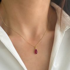 Tiny Ruby Necklace with a Genuine Ruby gemstone! This small Ruby Pendant Necklace is a July Birthstone Necklace! ✔️Genuine Red Ruby Necklace✔️ High-Quality  925 Sterling Silver ✔️ 24K Gold  Finish✔️ This Real Ruby necklace is great for wearing alone or for layering with other necklaces. It is the perfect gift for your girlfriend, sister, bridesmaids, or even yourself! Made by hand in Greece.   Moreover, RUBY is a really powerful crystal that promotes self-confidence and good fortune 👉A few word Ruby Teardrop Pendant Necklace, Gemstone Teardrop Pendant Drop Necklace, Red Teardrop Gemstone Drop Necklace, Red Teardrop Gemstone Necklace, Red Gemstone Drop Necklace For Gift, Ruby Drop Necklace For Gift, Drop Gemstone Crystal Necklace, Real Ruby Necklace, Red Ruby Necklace