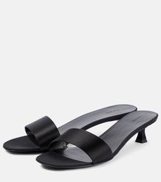 Combo satin faille mules in black - The Row | Mytheresa Elegant Formal Slides With Square Toe, Elegant Leather Slides With Sculpted Heel, Classic Open Toe Mules, Evening Mules With Removable Insole And Almond Toe, Evening Mules With Contrasting Heel Counter, Evening Slip-on Mules With Contrasting Heel, Classic Synthetic Mules For Evening, Elegant Open Toe Slides With Sculpted Heel, Formal Slides With Leather Sole And Open Heel