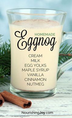 a glass mug filled with eggnog and cinnamon