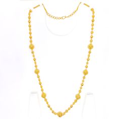 This handmade chain is a celebration of craftsmanship and tradition, made from 22k yellow gold that adds a warm, radiant glow to any attire. Weighing 60.0 grams, it boasts a substantial presence, signifying its high quality and durability. The chain extends over a length of 30 inches, adorned with beads that reach up to 13.25 mm in width, providing a striking visual impact. It features 1.7 inches of adjustable links, offering versatility and a personalized fit, complemented by a secure hook lock Yellow Gold Necklaces With Round Beads, Traditional Yellow Gold Long Temple Necklace, Traditional Long Yellow Gold Temple Necklace, 22k Gold Beads Jewelry For Puja, Festive Gold Beaded Chain Jewelry, Gold Long Necklace For Puja, Traditional Gold Chain Necklace For Formal Occasions, Traditional Gold Chain Jewelry For Formal Occasions, Traditional Gold Beaded Necklace