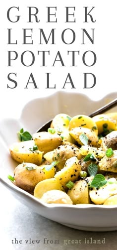 greek lemon potato salad in a white bowl with a spoon on the side and text overlay