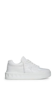 A single Maxi stud marks the intersection of quilting seams on this Italian sneaker featuring a whiteout design. Lace-up style Leather upper and lining/rubber sole Made in Italy Men's Designer Shoes White Sneakers With Contrast Stitching For Sports, White Low-top Sneakers With Contrast Stitching, White Casual Sneakers With Contrast Stitching, Casual White Sneakers With Contrast Stitching, Italian Sneakers, Mens Designer Shoes, Sneaker Men, Up Styles, Valentino Garavani