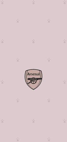 the logo for an official soccer team on a pink background