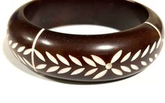 "Vintage carved Galalith plastic bracelet...walnut color with geometric floral design all around...3\" across inside" Early French, Geometric Flower, Flower Leaf, Hard Plastic, Leaf Design, Bangle Bracelet, Bangle Bracelets, Walnut, Jewelry Bracelets