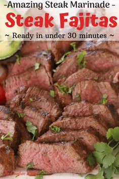 steak fajitas on a plate with cilantro and tomatoes