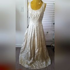 This Beautiful Champagne Brocade Long Evening Gown Has Hints Of Gold, New With The Original Tags From Nordstrom Size 8 Has A Petticoat Under The Skirt. Perfect Condition. Made In The U.S.A. Abs Evening Collection Brocade 100% Acetate Lining 100% Acetate Netting 100% Nylon Domestic Tea-length Satin Wedding Dress, Spring A-line Fitted Ball Gown, Formal Brocade Gown With Fitted Bodice, Elegant Brocade Gown With Fitted Bodice, Fitted Brocade Gown For Formal Occasions, Formal Fitted Brocade Gown, Fitted Tea Length Dresses For Mother Of The Bride, Formal Floor-length Brocade Dress, Elegant Brocade Dresses For Wedding