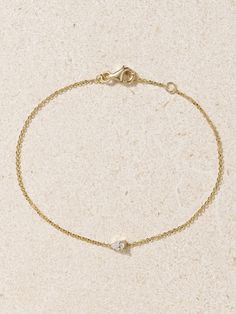 Kimaï's bracelet is a dainty addition to your everyday stack and looks equally elegant for formal events, too. Made from high-quality 18-karat recycled gold, it's embellished with a single laboratory-grown pear-cut diamond and has a slim, adjustable chain. Luxury Minimalist Brilliant Cut Bracelet, Delicate Formal Bracelet With Single Diamond, Delicate Single Diamond Bracelet For Formal Occasions, Classic Diamond Bracelet With Delicate Chain, Delicate 14k Gold Bracelets For Everyday Luxury, Luxury Minimalist Jubilee Diamond Bracelet, Classic Gold Bracelet With Single Diamond For Everyday, Delicate 14k Gold Bracelet With Single Diamond, Classic White Gold Diamond Bracelet With Delicate Chain