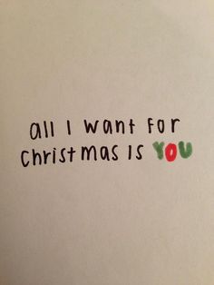 a piece of paper with the words all i want for christmas is you