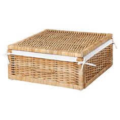 an empty wicker box with white handles