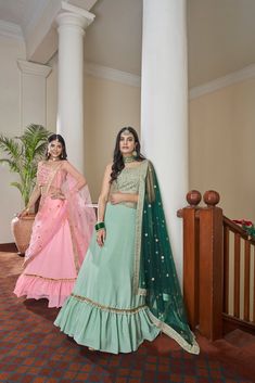 Green Titan Silk Dori, Mirror, Zari & Sequins Embroidered Lehenga Choli Set with Butterfly Net Dupatta Festive Green Unstitched Blouse Set, Green Lehenga With Zari Work For Eid, Festive Green Anarkali Set With Unstitched Blouse, Festive Pista Green Sharara With Unstitched Blouse, Green Anarkali Set With Unstitched Blouse For Festive Occasions, Green Self Design Anarkali Set For Navratri, Bollywood Style Green Lehenga With Traditional Drape, Green Designer Lehenga For Eid, Green Self-design Anarkali Set For Navratri