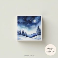 a card with the words happy christmas written on it in front of a snowy landscape