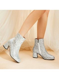 Eye-catching Sequin Design: These women glitter boots are adorned with shiny sequins, creating a dazzling and attractive look that will surely turn heads.Sparkle and Shine: The glittery exterior of these ankle boots adds a touch of glamour and elegance to any outfit, making them perfect for parties, events, and special occasions.High-quality Materials: Crafted with premium materials, these sparkly boots are durable and comfortable to wear. The boots of rhinestone detailing adds an extra touch of Glitter Ankle Boots, Heels Sparkly, Sparkly Boots, Sequin Heels, Shoes Chunky, Chunky Heel Booties, Chunky Heel Ankle Boots, Glitter Boots, Boots Chunky