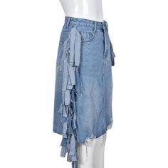 Expertly crafted with a stylish tassel detail, the Side Hustle Tassel Detail Denim Midi Skirt is the perfect addition to your wardrobe. Made from high-quality denim material, this skirt offers both comfort and durability. Elevate your style and add a touch of flair with this unique and versatile piece. Decoration Zip Up , Pockets , Tassel , Hole Style Casual Fabric Type Denim Material Polyester , Cotton Pattern Type Solid Season Summer Type Skirt Fabric Non-Stretch Blue Denim Asymmetrical Skirt, Blue Asymmetrical Denim Skirt, Casual Full-length Denim Skirt With Frayed Hem, Full-length Denim Blue Skirt With Frayed Hem, Black Jumpsuit Dress, Full-length Cotton Denim Skirt With Frayed Hem, Skirt Fabric, Denim Material, Denim Midi Skirt