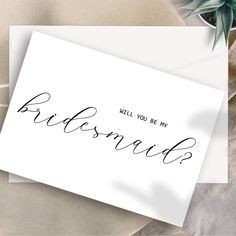 a card with the words, will you be my bridesmaid? on it