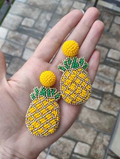 "Beaded pineapple fruit earrings Yellow embroidered tropical citrus jewelry Chunky big Statement summer bright funny drop dangle beadwork ♡I promise that you will always be in the spotlight with such earrings!♡ Size: length - 6 cm (2.4 inches) width - 3 cm (1.2 inches) ❤ CUSTOM ORDERS It is ABSOLUTELY HANDMADE . So if you like this item in a different color or size, send me a message please. I will send you a link for a \"custom order\" and you'll be able to place the order there. Please feel fr Yellow Beaded Drop Earrings For Summer, Handmade Yellow Beaded Earrings For Summer, Cute Beaded Earrings For Summer, Yellow Beaded Jewelry For Vacation, Handmade Yellow Jewelry For Summer, Summer Beach Jewelry With Fruit Design, Unique Yellow Earrings For Summer, Unique Yellow Summer Earrings, Fun Summer Fruit Design Jewelry