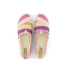 Your iconic go-to slip-on with vibrant, woven stripes to color your every day. Packed with comfortable features like cushy CloudBound™ outsoles and breathable OrthoLite® insoles, ideal for all-day wear. Make this must-have Alpargata shoe your staple pair. Each pair of this limited-edition Sunset Woven Stripe Alpargata is crafted using a multi-color textile pattern with a woven stripe detail. Expect your shoes to be delivered with eye-catching variation in the pattern as they were crafted. This v Striped Espadrilles, Textile Pattern, Recycled Rubber, Matches Fashion, Textile Patterns, Pink Yellow, To Color, Espadrilles, Every Day