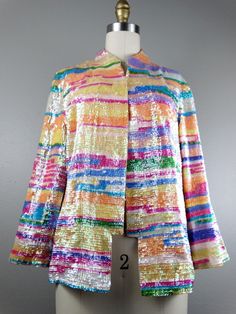 "This is a RARE and GORGEOUS vintage piece! It's fully embellished with colorful iridescent pastel sequins and accented with an embroidered bird on the back. It's in absolutely perfect condition! Bust - 40\" (with the one closure intact) Shoulders - 17\" hem to hem Sleeves - 20\" Length - 24\" Tag Size - US 10 All of my items come from a smoke-free and pet-free home. If you have any questions, please don't hesitate to ask!" Iridescent Sequin Fabric For Spring, Glamorous Multicolor Sequin Fabric For Spring, Spring Multicolor Sequin Fabric, Spring Embellished Multicolor Sequin Fabric, Embellished Multicolor Outerwear For Spring, Multicolor Embellished Outerwear For Spring, Sequin Kimono, Iridescent Sequin, Checkered Jacket