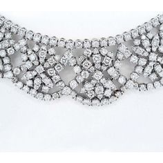 This breathtaking 18K White Gold Diamond Collar Necklace is an exquisite piece that will make you feel like a true queen on those extraordinary occasions. Life presents us with only a handful of special moments, whether it's a wedding, a graduation, an anniversary, or perhaps a glamorous red carpet event. And for those nights when you want to shine and make a lasting impression, this necklace is the perfect choice.From our rare jewels collection, this necklace is a true masterpiece. It is adorne Opulent Round Necklaces For Formal Occasions, Opulent Diamond Necklace For Formal Events, Opulent Diamond Necklace For Formal Occasions, Exquisite Evening Diamond Necklace, Luxury Bridal Necklace In Diamond White With Diamond Cut, Luxury Cubic Zirconia Diamond Necklace For Formal Occasions, Luxury Silver Bridal Necklace With Prong Setting, Luxury Party Necklace With Brilliant Cut, Luxury Brilliant Cut Necklaces For Party