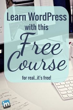 a desk with a keyboard, mouse and monitor on it that says learn wordpress with this free course for real it's free