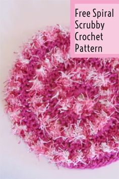 a pink and white crochet doily with text overlay that reads free spiral scrubby crochet pattern