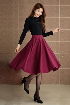 Discover elegance in our wine-red wool pleated midi skirt, a timeless addition to your winter wardrobe. The rich wine-red hue exudes sophistication, while the premium wool fabric ensures warmth and comfort.  DETAILS: * 30% wool, 30% fiber, 40% polyester * Fully satiny liner * Two side pockets * Left zipper closure * Left buttons decoration * Pleated skirt, circle skirt * Back elastic waist * High waist skirt * Below the knee skirt * Perfect for Winter, autumn * Dry clean * Lean More about the items From the FAQs on the page bottom MODEL SIZE Bust 85 cm(33.4") Waist 67 cm(26.7") Height 168cm (5' 6") She wears size XS CUSTOM MADE SERVICE If you * Change other color * Can't find your size in our size Chart * Change the Style * Change the length * Your Height is not Between 5'1" - 5"9" * Your Winter Solid Pleated Skirt, Winter Pleated Full Maxi Skirt, Elegant Burgundy Midi Skirt, Winter Midi-length Lined Skirt, Solid Color Full Skirt For Fall, Winter Pleated Midi Skirt, Winter Midi Pleated Skirt, Winter Solid Color Flared Skirt, Burgundy Flared Skirt For Fall