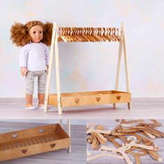 a doll stands next to a wooden rack with hearts on it