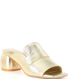 a pair of gold mules with an open toe