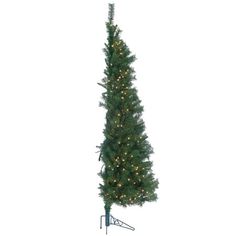 a tall christmas tree with lights on it's top and an upside down pole