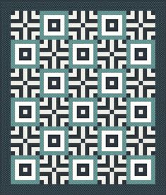 a black and white quilt with squares in the shape of rectangles on it