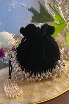 Shop for Nayaab by Sonia Velvet Pearl Embellished Potli Online at Aza Fashions Velvet Potli Bags, White Potli Bags, Black Potli Bags, Potli Purses Handmade, Potli Bags Diy, Handmade Bag Design, Fancy Bags Purses, Purse Design Ideas, Potli Design