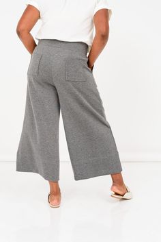 The Escape Wide Leg Pant is the perfect combination of travel-ready comfort and polished style. Made from a luxuriously soft, eco-friendly recycled material that feels like a mix of butter, silk, and clouds, these pants offer all-day comfort without sacrificing sophistication. Whether you’re pairing them with the Escape Poncho for a cozy, chic look or dressing them up with the Escape Cowl Neck Top, they elevate your “sweatpants” style to a whole new level. Ideal for both long flights and leisure Spring Loungewear Pants With Soft Texture, Soft Texture Loungewear Bottoms For Spring, Soft Texture Bottoms For Spring Loungewear, Chic Tapered Leg Sweatpants For Loungewear, Versatile Wide Leg Pants With Comfort Waistband For Loungewear, Ankle-length Wide Leg Pants For Loungewear, Versatile Lounging Wide-leg Pants, Versatile Loungewear Bottoms With Pockets, Versatile Cargo Pants For Loungewear