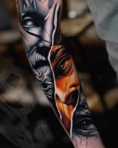 a man's arm with an artistic tattoo on it