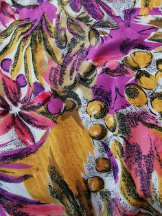 Vintage oversized tropical print blouse from the 1980's. Women's button up top with exotic flowers print in bright colors - purple, magenta,mustard yellow, green and white. Has short sleeves and boxy shape. Material: Not marked. Feels like cotton-viscose blend. Size: Missing tag. Fits like women's M. To be sure this item would fit you, please look at the measurements below. Approximate measurements (taken when shirt is lying flat, double armpit to armpit and waist): Shoulder to shoulder (from se Vibrant Tropical Print Blouse For Beach, Multicolor Floral Print Hawaiian Shirt For Summer, Multicolor Floral Print Hawaiian Shirt For Beach, Multicolor Floral Hawaiian Shirt For Beach, Tropical Style Multicolor Printed Blouse, Vintage Floral Print Blouse For Vacation, Retro Multicolor Hawaiian Shirt With Floral Print, Pink Floral Print Tropical Hawaiian Shirt, Pink Tropical Hawaiian Shirt With Floral Print