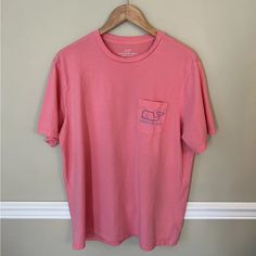 Never Worn. Men’s Vineyard Vines Shirt. Pink With Blue Whale. Never Worn. There Is A Small Blue Mark On Back Of Shirt As Pictured. So Tiny, But Wanted To Mention. Guessing In Production A Tiny Bit Went Out Of Stamp. So Truly One Of A Kind! Pink Cotton T-shirt With Pockets, Pink Cotton Short Sleeve Shirt, Pink Cotton Shirt With Pockets, Casual Pink Shirt With Pockets, Pink Relaxed Fit Shirt With Pockets, Pink Cotton Tops With Pockets, Casual Pink T-shirt With Pockets, Pink Crew Neck T-shirt With Pockets, Aesthetic Vineyard