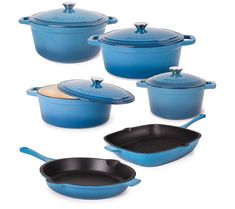 blue cast iron pots and pans with lids on a white background, set of four