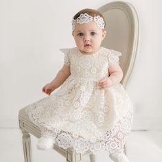 Handmade in the USA A perfect blend of traditional fashion and contemporary style, the Poppy baby dress is a sweet and elegant design for her special occasion whether its her first birthday outfit, flower girl dress, or her blessing dress. This beautiful designer baby dress is hand crafted with a rich silk dupioni lining in a shade of ivory. The subdued silk color is the perfect shade to enhance the intricate floral lace that lays on top. Adorable lace cap sleeves and lace scallops on the bodice Silk Baby Dress, Lace Baby Dress, Baby Blessing Dress, Baby Fancy Dress, Baby Lace Dress, Blessing Dress, Lace Bonnet, Poppy Dress, Silk Dupioni