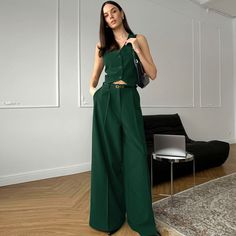 Material: 95% polyester and 5% spandex Size(cm) Top Length Bust Bottom Length Waist Hip S 48 90 110 64 100 M 49 94 111 68 104 L 50 98 112 72 108 Add a touch of vintage flair to your summer wardrobe with our women's V-neck sleeveless vest and loose long pants set, available in pink, green, and black. Crafted from a soft and skin-friendly blend of 95% polyester and 5% spandex, this two-piece outfit ensures comfort and breathability. The vintage-inspired design features a flattering V-neck sleevele Casual Sleeveless Workwear Sets, Casual Sleeveless Sets For Workwear, Casual Fitted Sleeveless Pantsuit, Sleeveless Solid Color Workwear Pantsuit, Casual Solid Color Sleeveless Pantsuit, Solid Sleeveless Pantsuit For Work, Sleeveless Solid Color Pantsuit For Spring, Green Pants Outfit, Vest And Pants