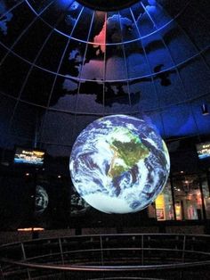 an image of the earth on display in a museum