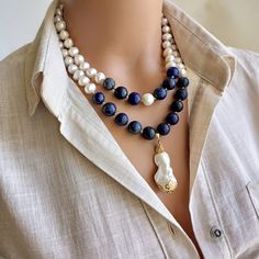 A timeless accessory that embodies natural beauty, the elegant Pearl and Lapis Lazuli Necklace combines lustrous freshwater pearls, known for their lustrous and iridescent appeal for women, with the deep blue appeal of real Lapis Lazuli natural stones. Handmade with love and attention to detail, this stunning necklace exudes a sense of opulence and elegance. MATERIALS: Freshwater pearls: These stunning pearls are prized for their pure brilliance and attractive shine, making each bead unique in i Designer Pearl Necklace, Pearl Charm Necklace, Handmade Wedding Gifts, Natural Stone Necklace, Lapis Lazuli Necklace, Natural Stones Necklace, Etsy Bridesmaid Gifts, Accessories Wedding, Women Necklace