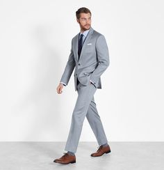 Light Grey Suit | The Black Tux Grey Suit Blue Tie, Grey Suit Brown Shoes, Mens Photos, Light Grey Suit, Mens Linen Outfits, Gray Groomsmen Suits, Grey Dress Pants Men, Suit Fashion Men's, Light Brown Boots