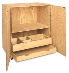 an open wooden cabinet with drawers on the bottom and one drawer in the top section