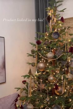 a decorated christmas tree with lights and ornaments