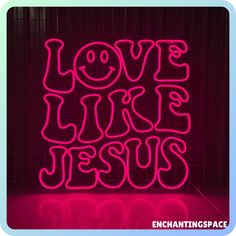 a neon sign that says love like jesus