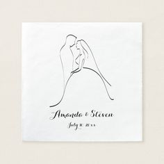 a white square paper with an ink drawing of a bride and groom kissing on the forehead