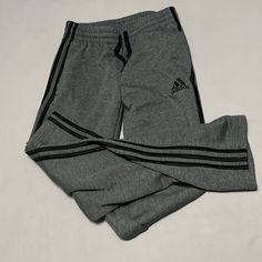 Brand New/ Without Tags. Never Worn. Big Boys Small. Cheap Adidas Streetwear Bottoms, Adidas Gray Bottoms For Sports, Adidas Cotton Bottoms For Winter, Adidas Sports Pants In Gray, Adidas Gray Athleisure Activewear, Adidas Gray Sports Bottoms, Adidas Gray Sports Pants, Black Adidas Cotton Sweatpants, Adidas Black Cotton Sweatpants